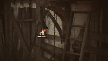 CGI Old lantern hanging in rustic wooden room with ladder and walls video