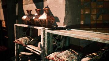 CGI Vases and pillows decorate a rustic shelf in a cultural space video