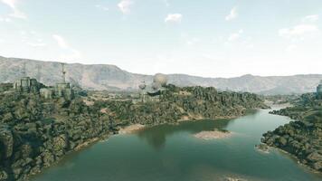 CGI Lush river landscape with rocky terrain and distant mountains during daytime video