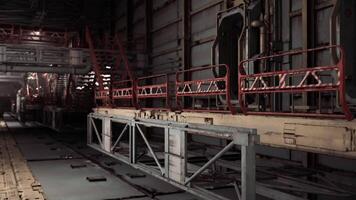 CGI An industrial facility features several maintenance platforms with red railings video