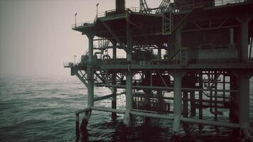 CGI Oil rig structure over water during cloudy weather in offshore location video