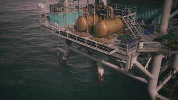 CGI Oil rig situated in open water with large storage tanks visible above deck video