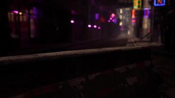 CGI Neon lights illuminate a deserted alley at night with a mysterious atmosphere video
