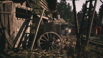 CGI Rustic wooden structures and an old wagon wheel in an overgrown setting video