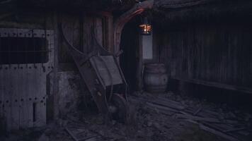 CGI Vintage cart and lantern in an old rustic barn at twilight video