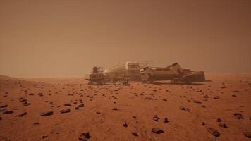 CGI Mars colony settlement in a dusty landscape under a reddish sky video