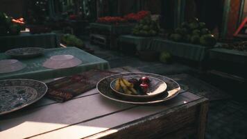 CGI Fresh fruits on traditional plates at a lively afternoon market video
