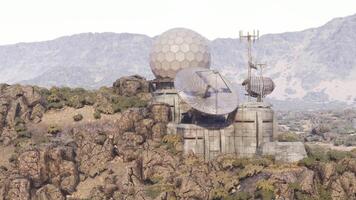 CGI Remote observation station nestled in rugged terrain of mountainous region video