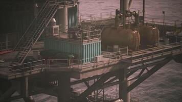 CGI Oil rig platform working in offshore waters under a clear sky video