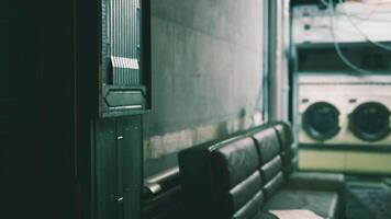 CGI Empty hallway with faded walls and a waiting area near a laundromat video