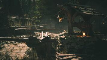 CGI Rustic lanterns illuminate a serene woodland setting during twilight hours video