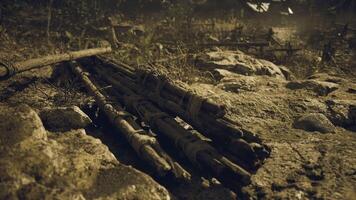 CGI Bamboo sticks resting on rocky terrain in a dimly lit environment video