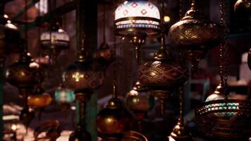 CGI Beautifully crafted hanging lanterns in a bustling market setting video