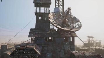 CGI Rusty satellite dish on industrial structure against clear sky at dawn video