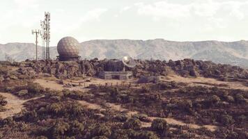CGI Communication hub located in mountainous region during daylight hours video