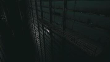 CGI Mysterious shadows cast within an abandoned warehouse at night video