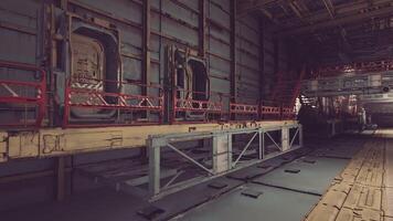 CGI Industrial interior with red railings and equipment in a large space video