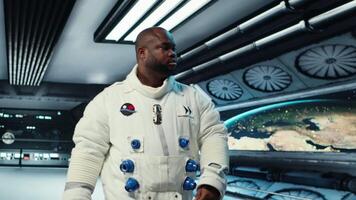 Astronaut walking inside futuristic spacecraft, preparing for scientific mission. Spaceship crew member in advanced spacesuit exiting station to do planetary exploration, camera B video