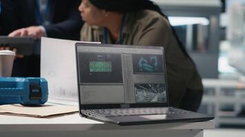 Black engineering specialists reviewing operational workflows in solar power manufacturing plant. Engineers integrating teamwork in alternative energy production line and development. Camera A. video