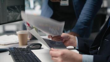 Team of diverse engineers partners evaluating solar performance in high tech industrial factory, focusing on sustainable energy development. Alternative power for modern operations. Camera A. video