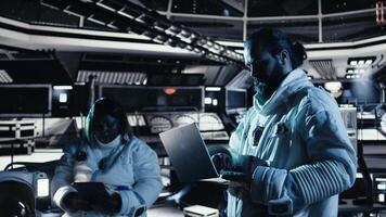 Researchers flying together in starship exploring Mars planetary surface. Cosmonauts ensuring operational readiness before landing on red planet to study cosmic origins, camera A video