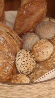 Fresh baked bread rolls in a cozy basket video
