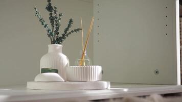 Home decor display with fresh greenery and calming scents video