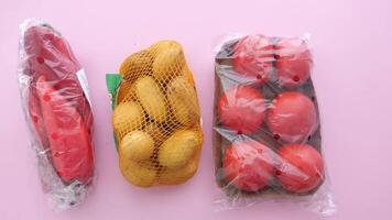 Fresh produce display with colorful packaging at market video