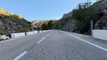Experience an incredibly breathtaking drive through winding mountain roads that are beautifully surrounded by nature photo