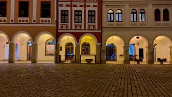 A breathtakingly picturesque night view showcases charming historic buildings adorned with beautiful archways photo