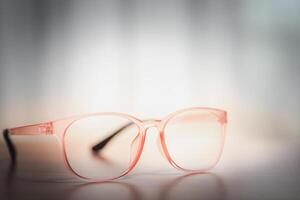 Round Pinkish Red Eyeglasses, A Blend of Elegance, Simplicity, and Style photo