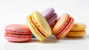 Colorful fresh cut pastel macarons are arranged in a group, isolated on a white background. The image is suitable for illustrating bakery, dessert, or confectionery concepts in food-related projects. photo