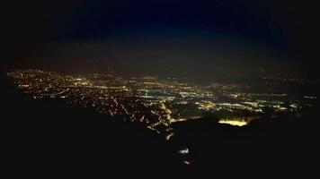 The city of Liberec at night, view from the mountain with zoom. High quality 4k footage photo