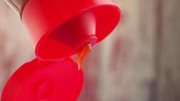 red sauce bottle with dripping product video
