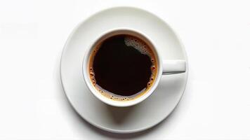 Isolated cup of espresso coffee on a white background, viewed from above. Suitable for illustrating beverage, caffeine, or morning concepts. photo
