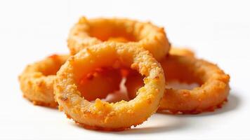 Golden brown crispy fried onion rings are arranged in a stack, isolated on a clean white background. The image is suitable for illustrating fast food, snack options, or menu items. photo