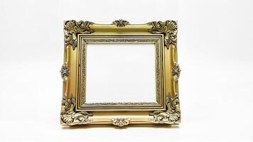 Decorative square empty frame isolated on white background. Useful for antique, vintage, or classic art and design projects. photo