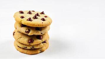 A stack of chocolate chip cookies is isolated on a white background for food advertising or recipe illustration. Suitable for bakery, dessert, or snack concepts. photo