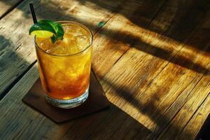 Iced Tea Drink Garnished With Mint and Lime photo