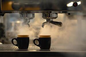 Two coffee cups are steaming photo