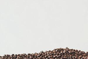 Roasted Coffee Beans Against A White Background photo