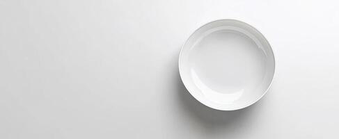 A White Oval Bowl on a White Background photo