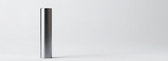 A vertical metallic cylinder stands on a white background photo