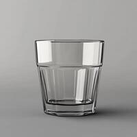 A Clear Empty Glass Stands On A Gray Surface photo