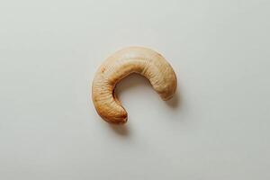 Single Roasted Cashew Nut Isolated On White Background photo