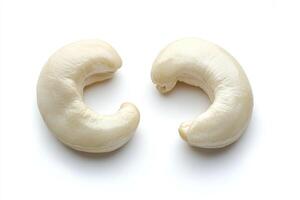 Two Roasted Cashew Nuts Isolated on White Background photo