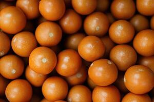 A Close Up View Of Many Orange Cape Gooseberries photo