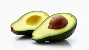 Isolated ripe avocado halves with exposed pit and tender flesh on a white background. Useful for food, nutrition, and healthy eating concepts. photo