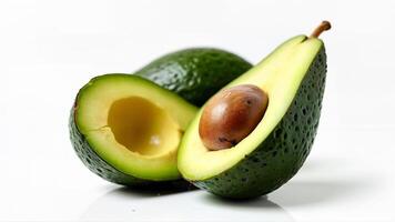 Isolated ripe avocado cut in half with pit and tender flesh on a white background. Useful for food, nutrition, and healthy eating concepts. photo