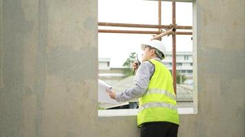 Engineers construction projects inspect and supervise the construction of building walls,96 photo
